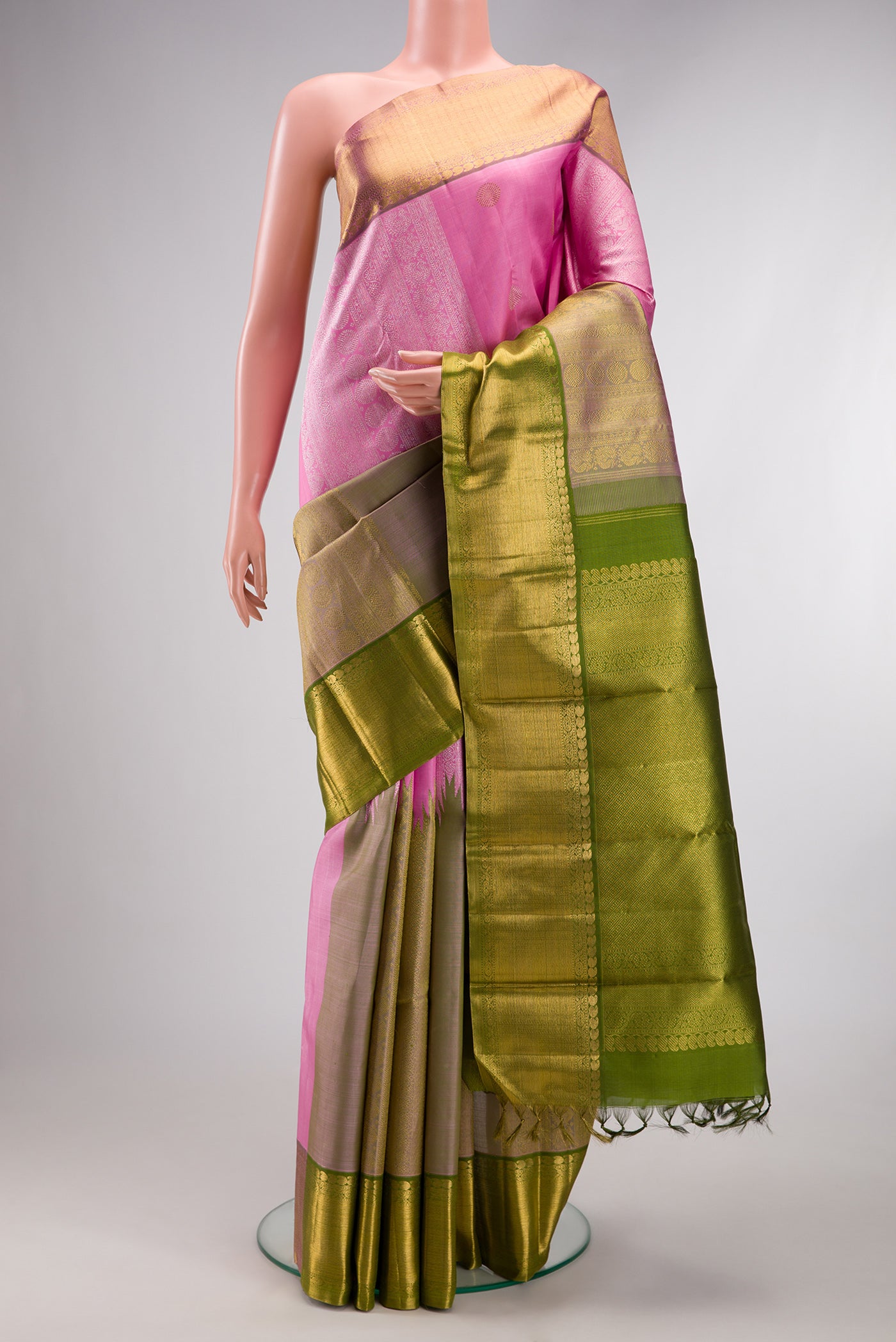 Pure Silk Pure Zari Pink Dual Tone Kanchipuram Saree with Stripes on the body and Fancy Border.  displayed on a mannequin