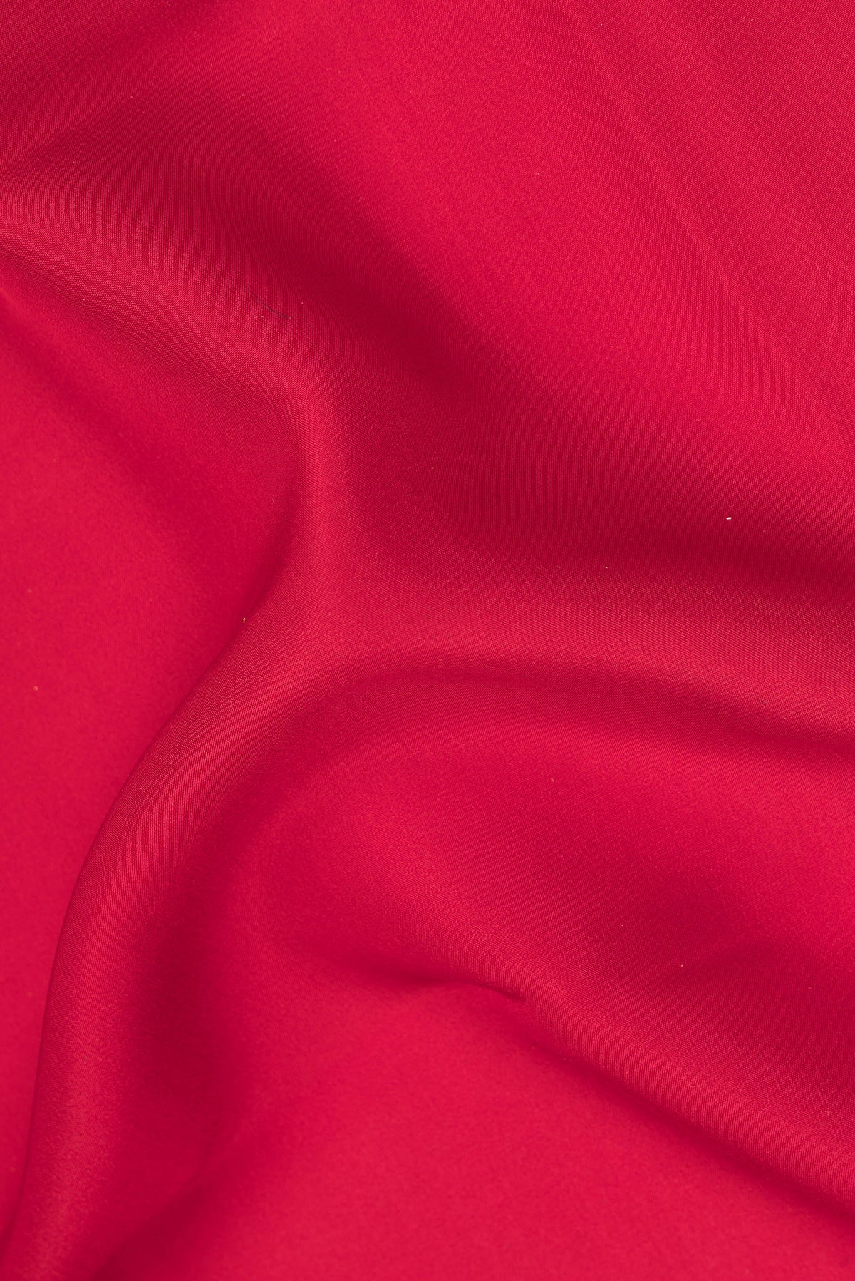 Close up of Pure Silk Pure Zari Red Mysore Silk Saree with Plain Body and Zari Border.  displaying folds