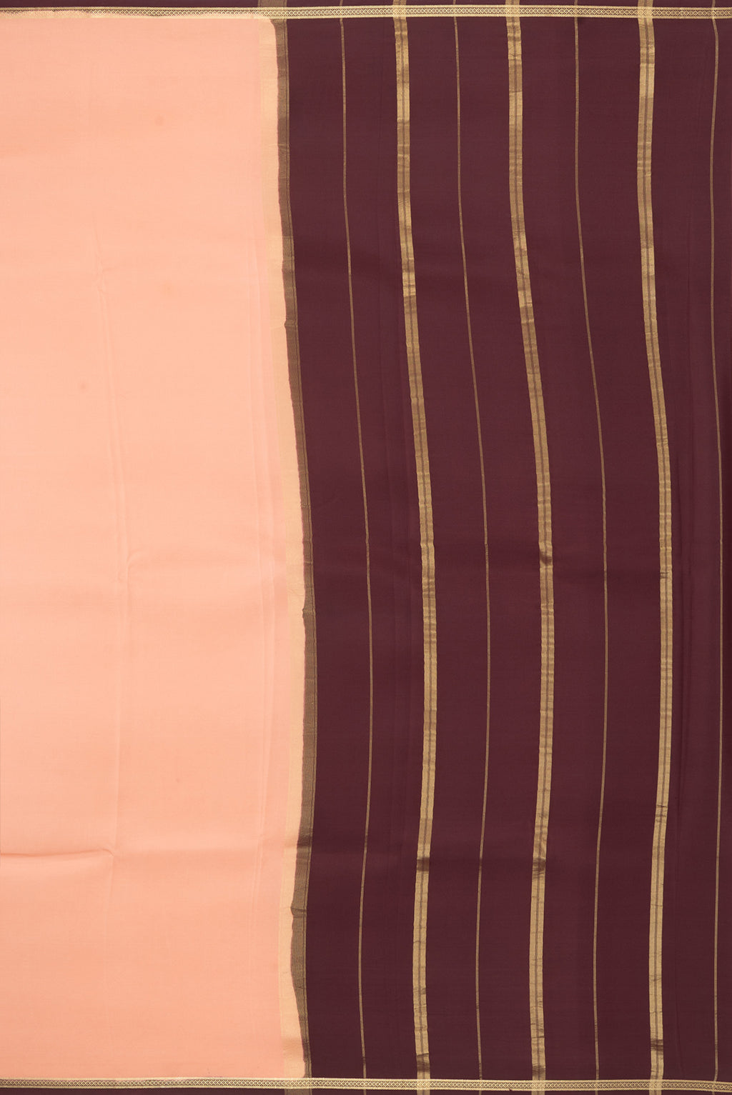 Close up image of the pallu of Pure Silk Pure Zari Golden Peach Mysore Silk Saree with Plain Body and Zari Border. 
