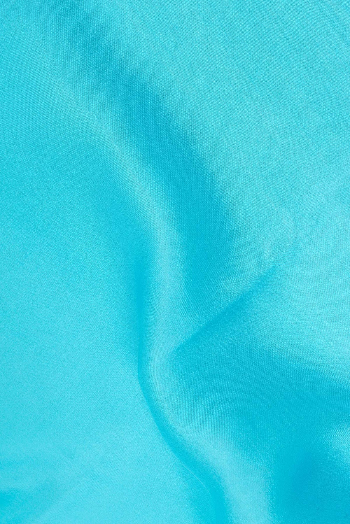 Close up of Pure Silk Pure Zari Sky Blue Mysore Silk Saree with Plain Body and Zari Border.  displaying folds
