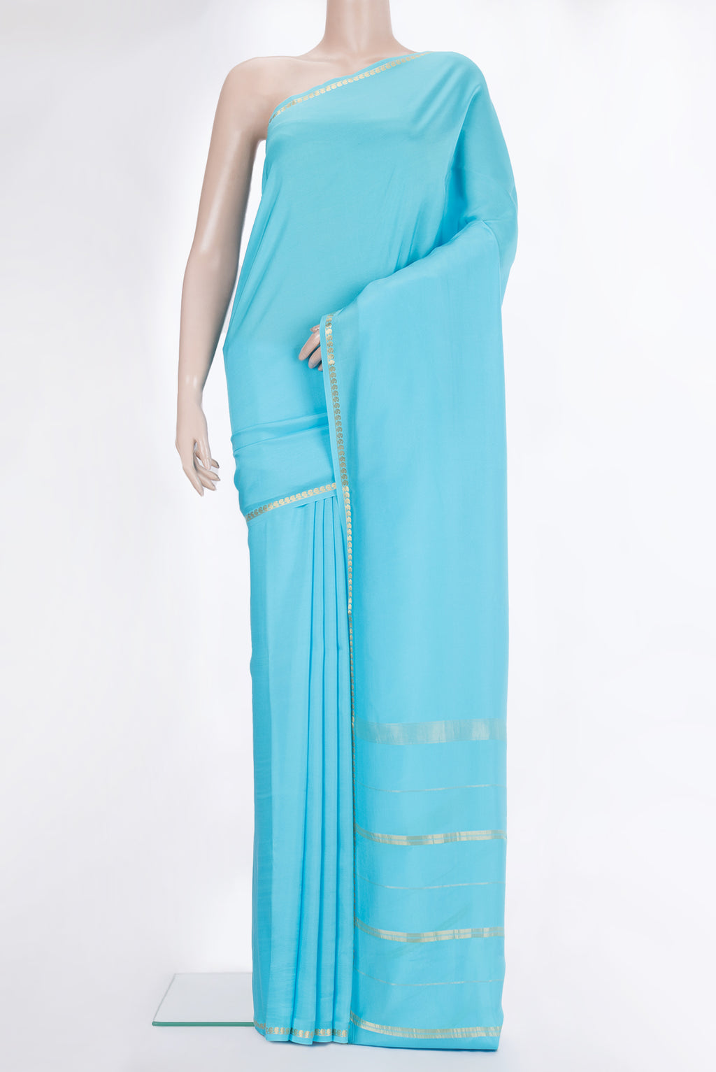 Pure Silk Pure Zari Sky Blue Mysore Silk Saree with Plain Body and Zari Border.  displayed on a mannequin