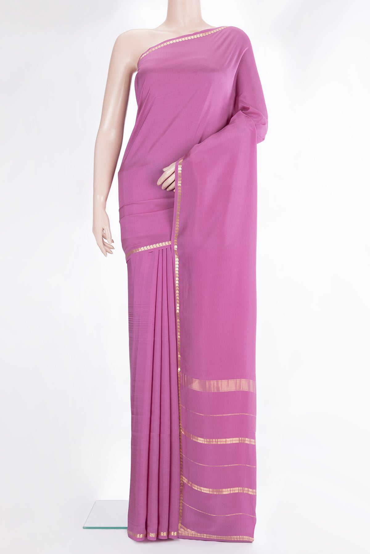 Pure Silk Pure Zari Pink Mysore Silk Saree with Plain Body and Zari Border.  displayed on a mannequin