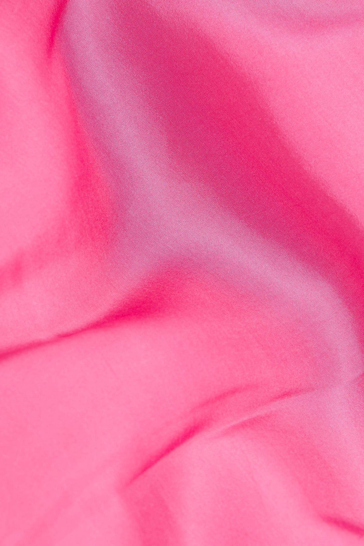 Close up of Pure Silk Pure Zari Pink Mysore Silk Saree with Plain Body and Zari Border.  displaying folds