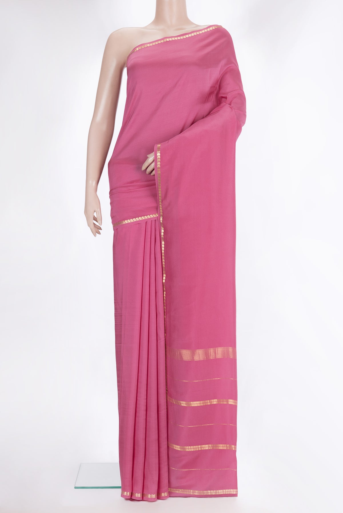 Pure Silk Pure Zari Pink Mysore Silk Saree with Plain Body and Zari Border.  displayed on a mannequin