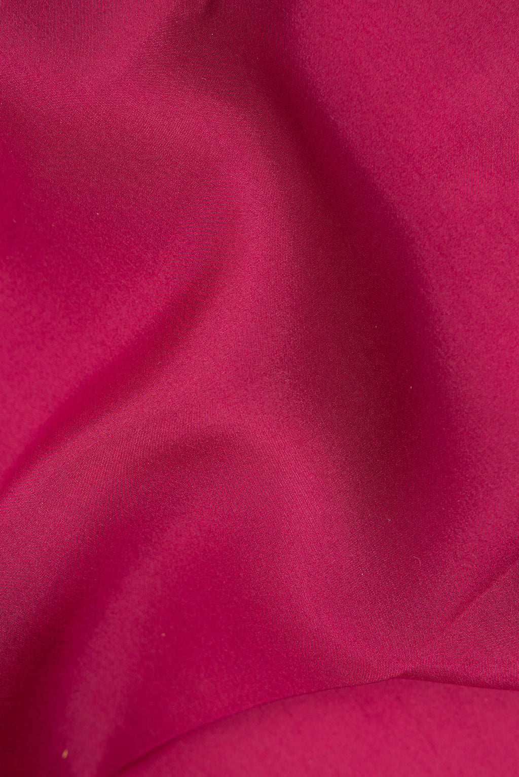 Close up of Pure Silk Pure Zari Maroon Mysore Silk Saree with Plain Body and Zari Border.  displaying folds