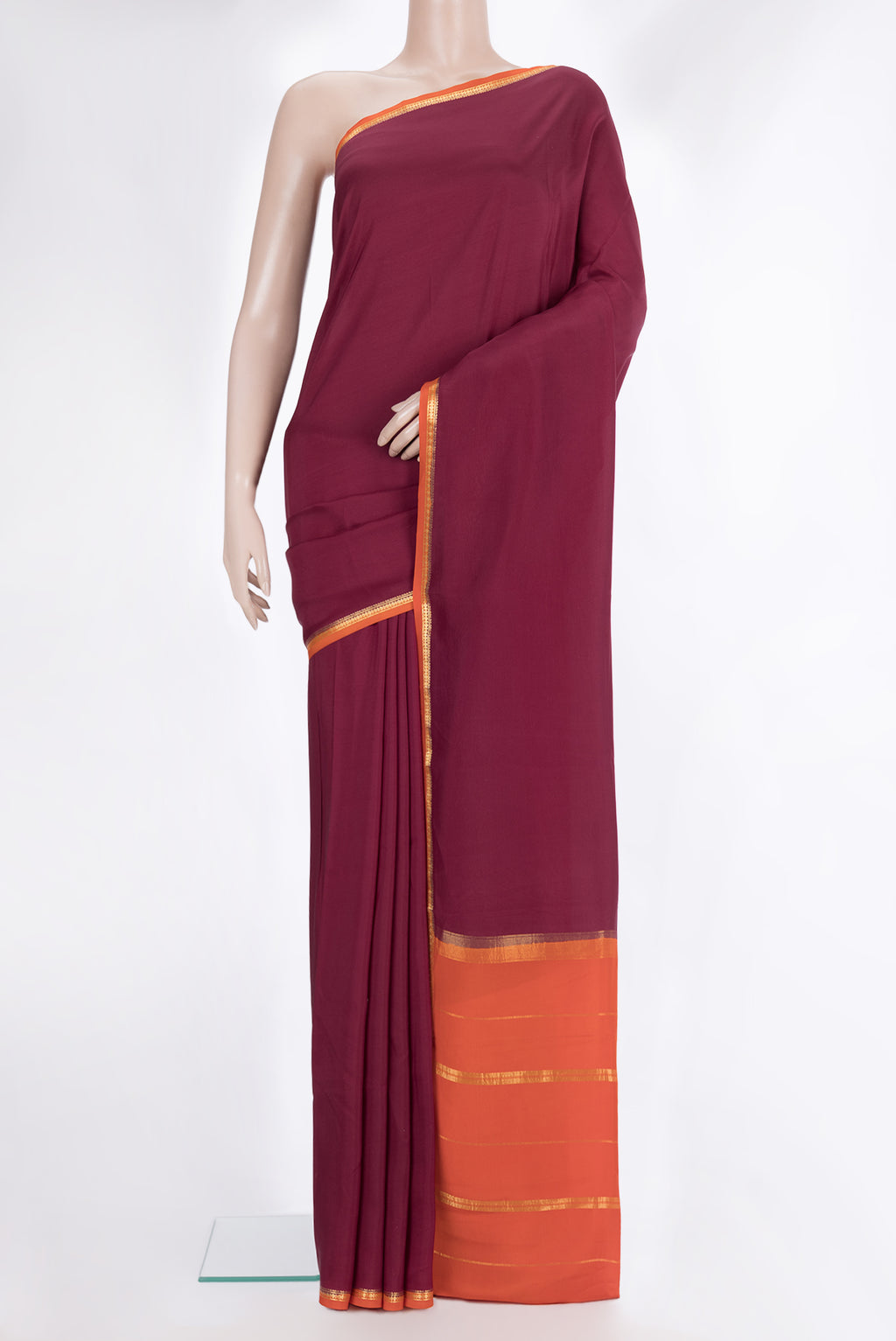 Pure Silk Pure Zari Maroon Mysore Silk Saree with Plain Body and Zari Border.  displayed on a mannequin