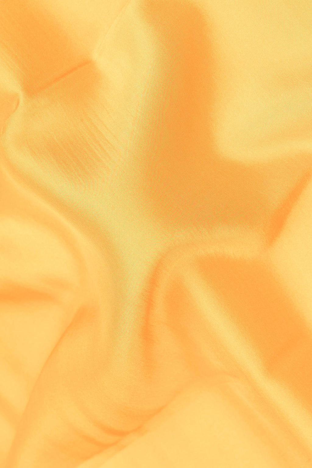 Close up of Pure Silk Pure Zari Yellow Mysore Silk Saree with Plain Body and Zari Border.  displaying folds