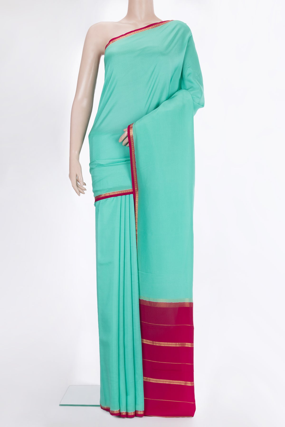 Pure Silk Pure Zari Sea Green Mysore Silk Saree with Plain Body and Zari Border.  displayed on a mannequin