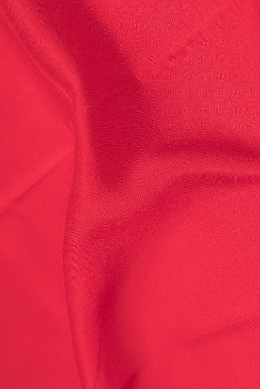 Close up of Pure Silk Pure Zari Red Mysore Silk Saree with Plain Body and Zari Border.  displaying folds