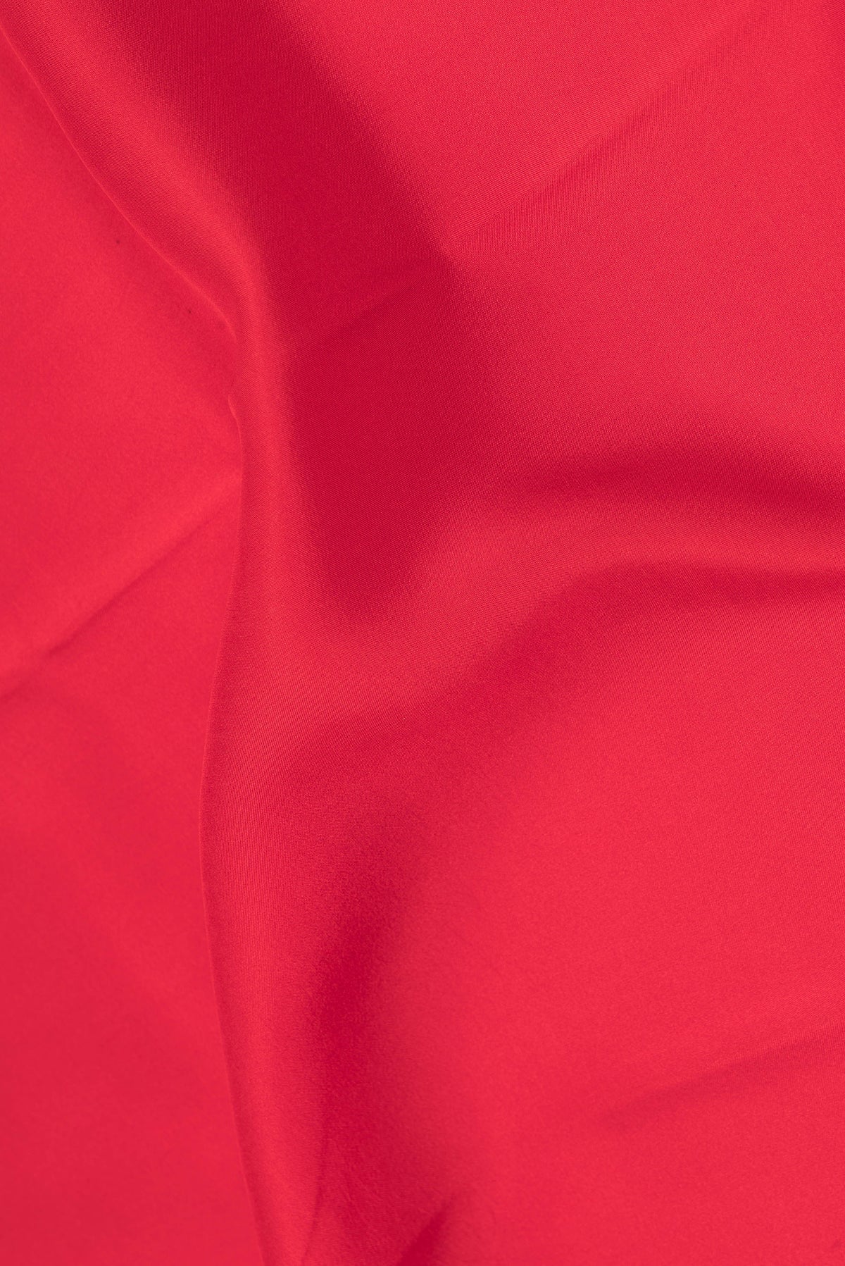 Close up of Pure Silk Pure Zari Red Mysore Silk Saree with Plain Body and Zari Border.  displaying folds