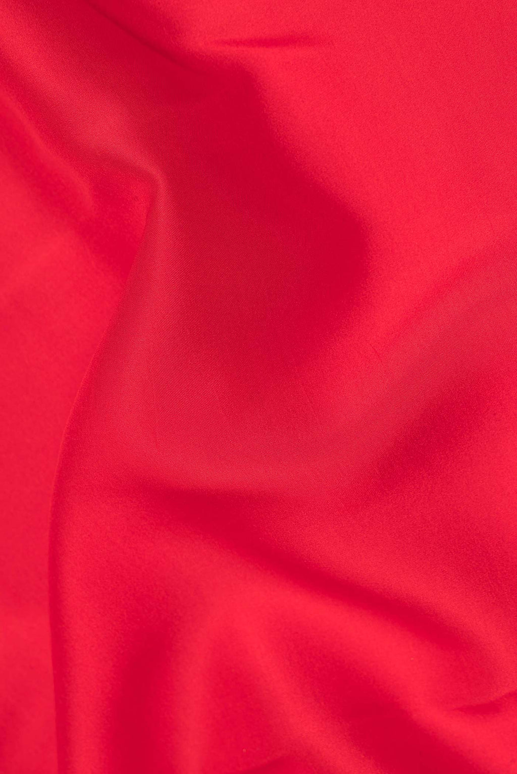 Close up of Pure Silk Pure Zari Red Mysore Silk Saree with Plain Body and Zari Border.  displaying folds