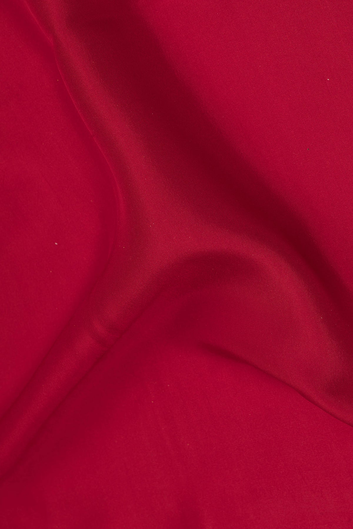 Close up of Pure Silk Pure Zari Deep Red Mysore Silk Saree with Plain Body and Zari Border.  displaying folds