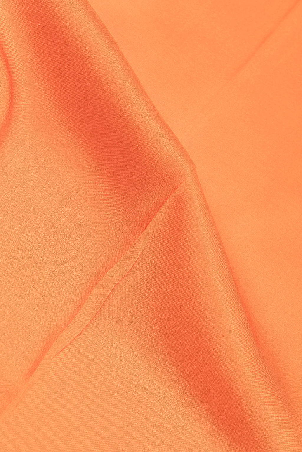 Close up of Pure Silk Pure Zari Orange Mysore Silk Saree with Plain Body and Zari Border.  displaying folds