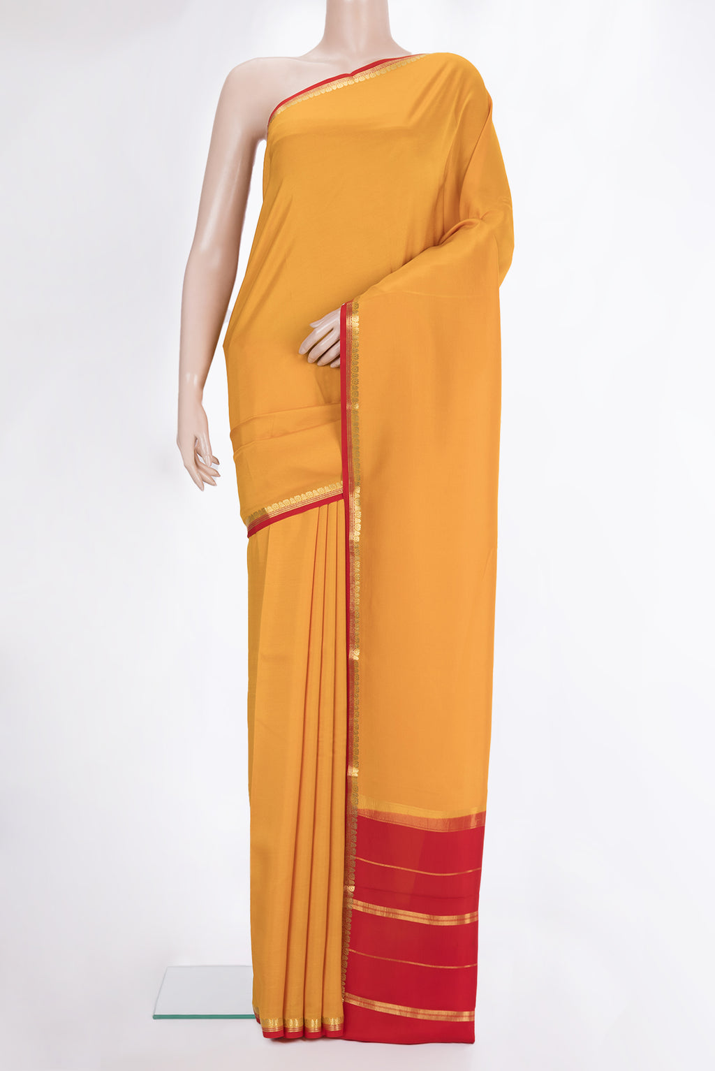 Pure Silk Pure Zari Mustard Mysore Silk Saree with Plain Body and Zari Border.  displayed on a mannequin