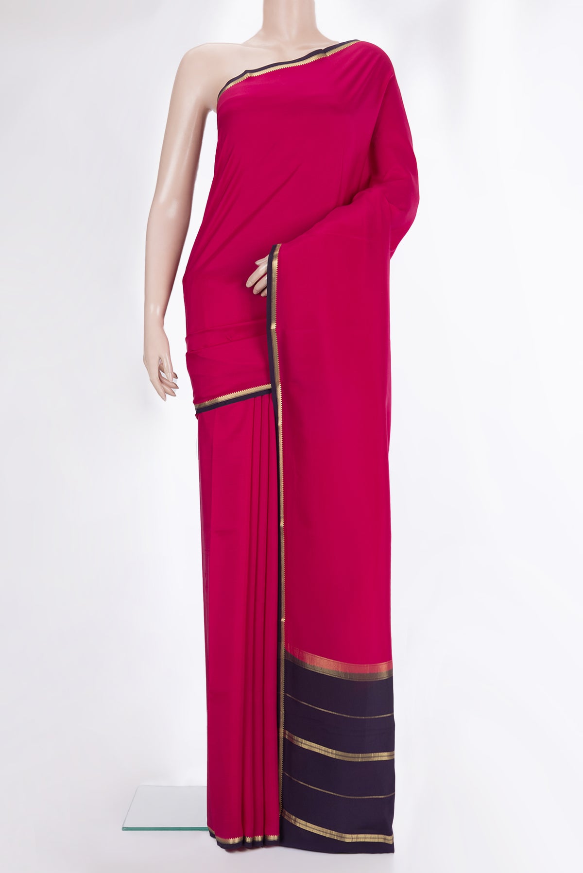 Pure Silk Pure Zari Dark Pink Mysore Silk Saree with Plain Body and Zari Border.  displayed on a mannequin