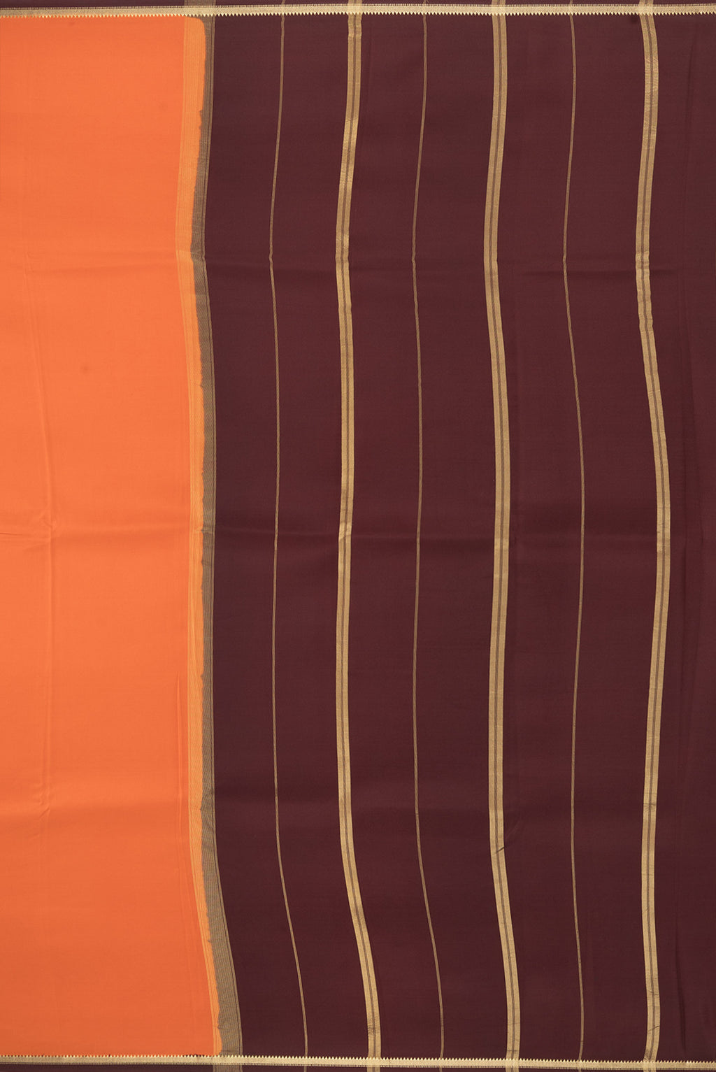 Close up image of the pallu of Pure Silk Pure Zari Orange Mysore Silk Saree with Plain Body and Zari Border. 