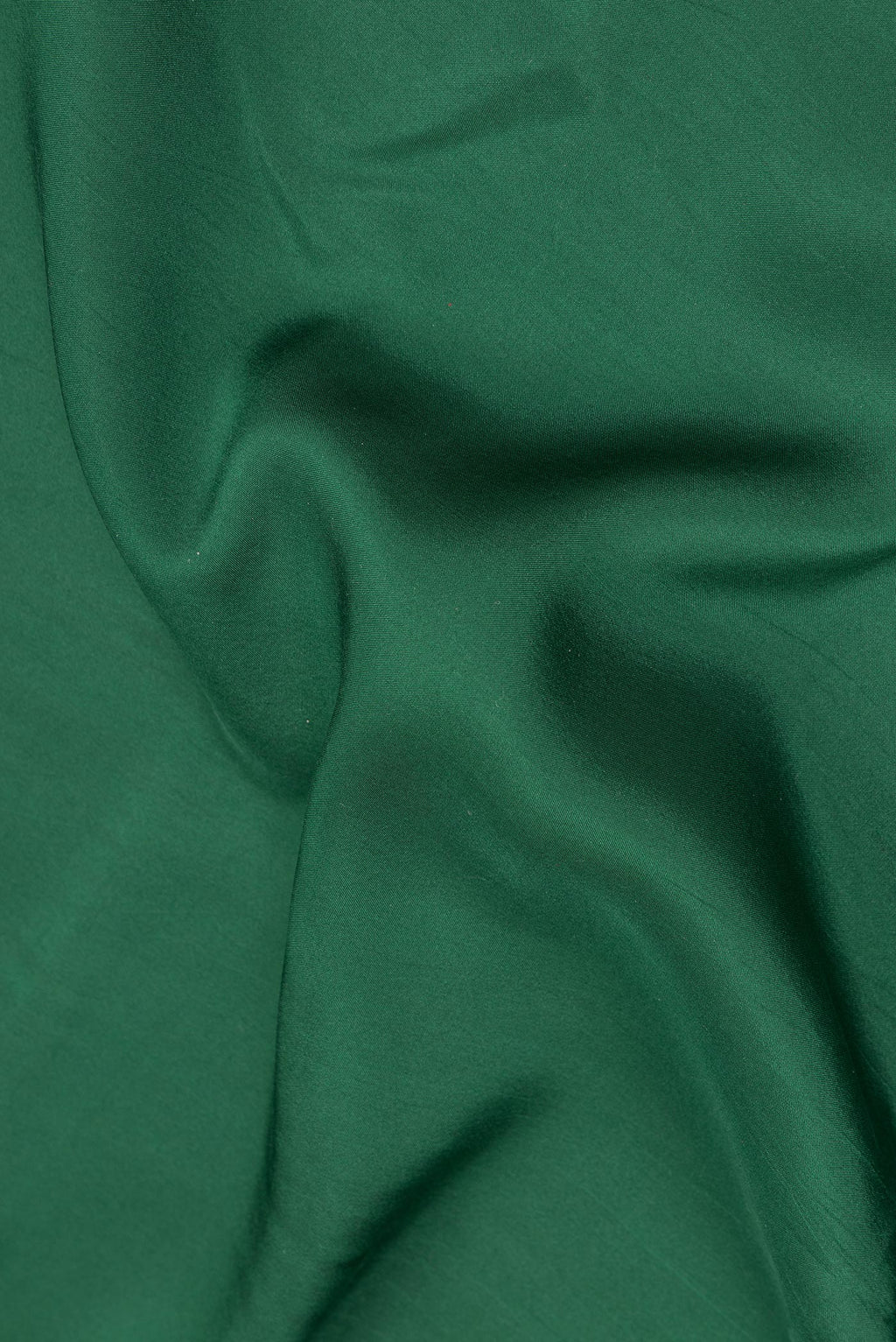 Close up of Pure Silk Pure Zari Bottle Green Mysore Silk Saree with Plain Body and Zari Border.  displaying folds