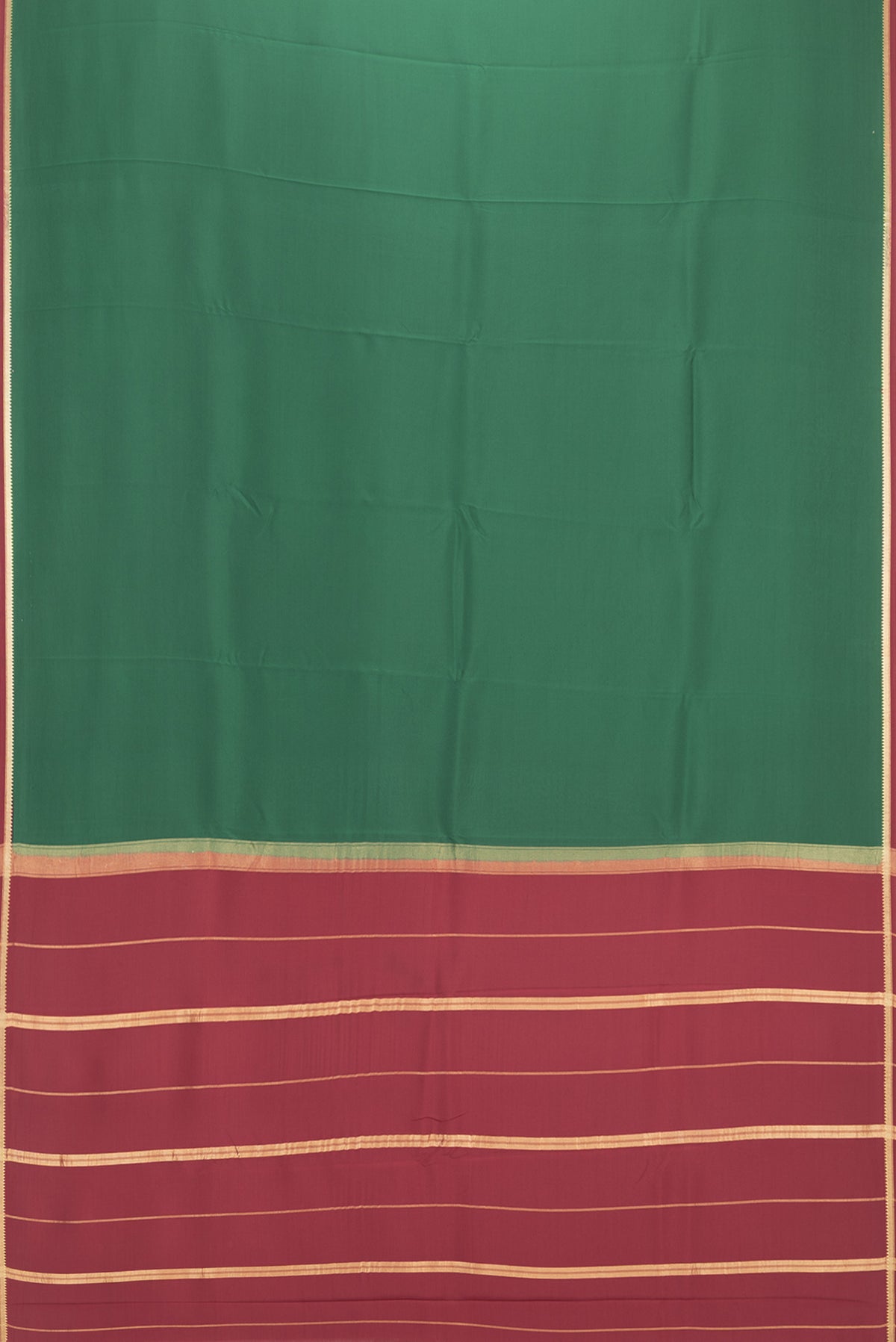 Flat view of Pure Silk Pure Zari Bottle Green Mysore Silk Saree with Plain Body and Zari Border. 