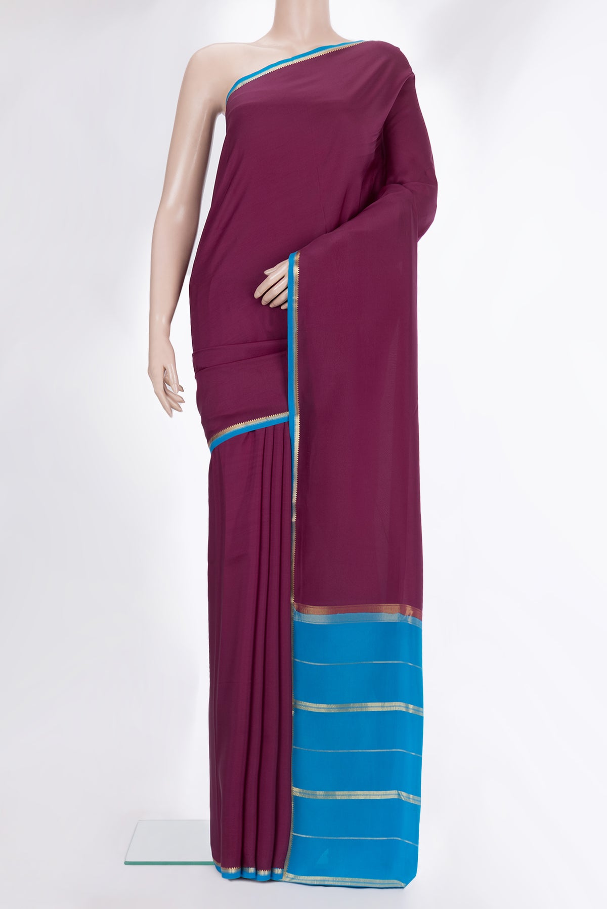 Pure Silk Pure Zari Magenta Dual Tone Mysore Silk Saree with Plain Body and Zari Border.  displayed on a mannequin