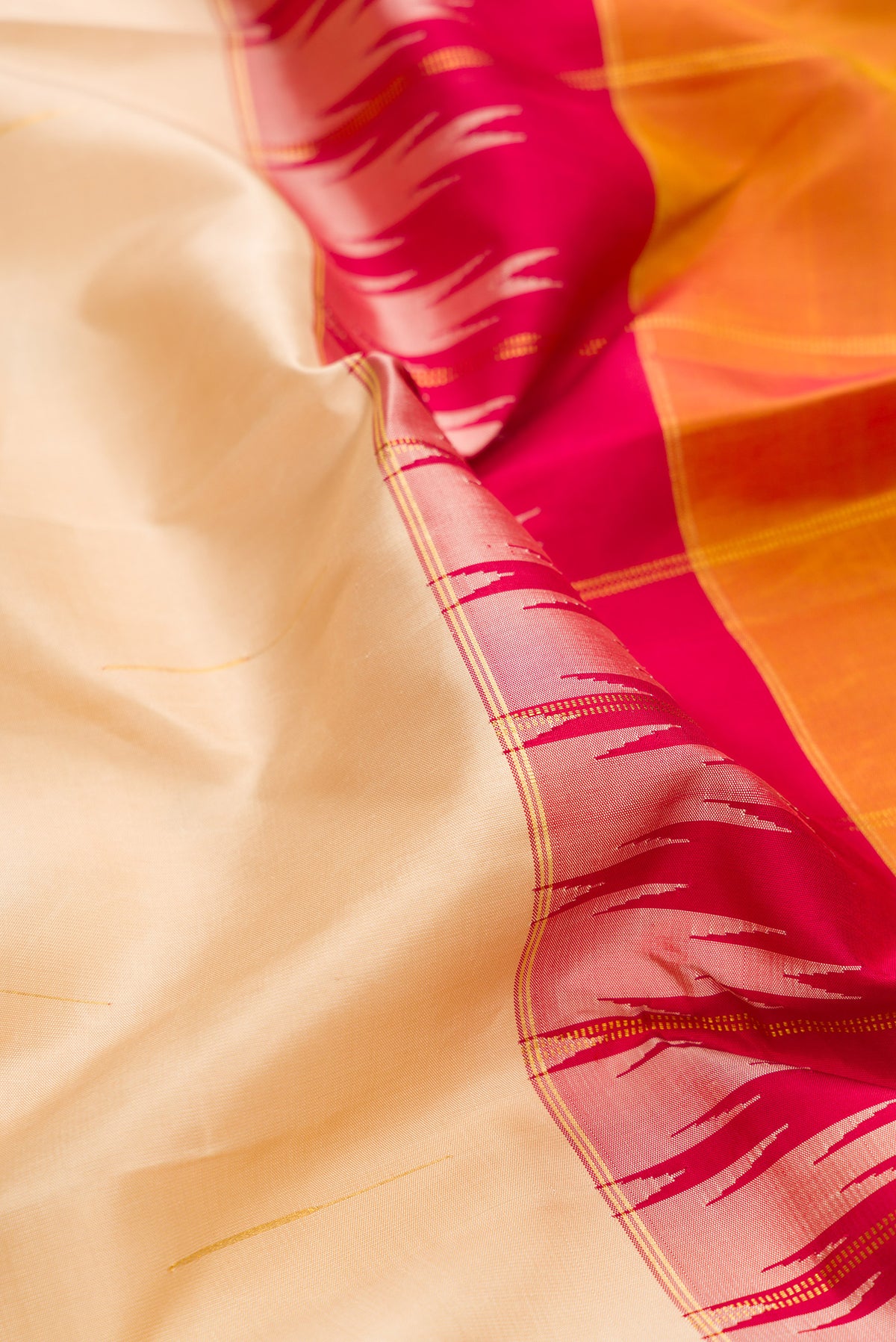 Close up of Pure Silk Multi Color Kanjivaram Saree with Half And Half on the body and Zari Border.  displaying folds