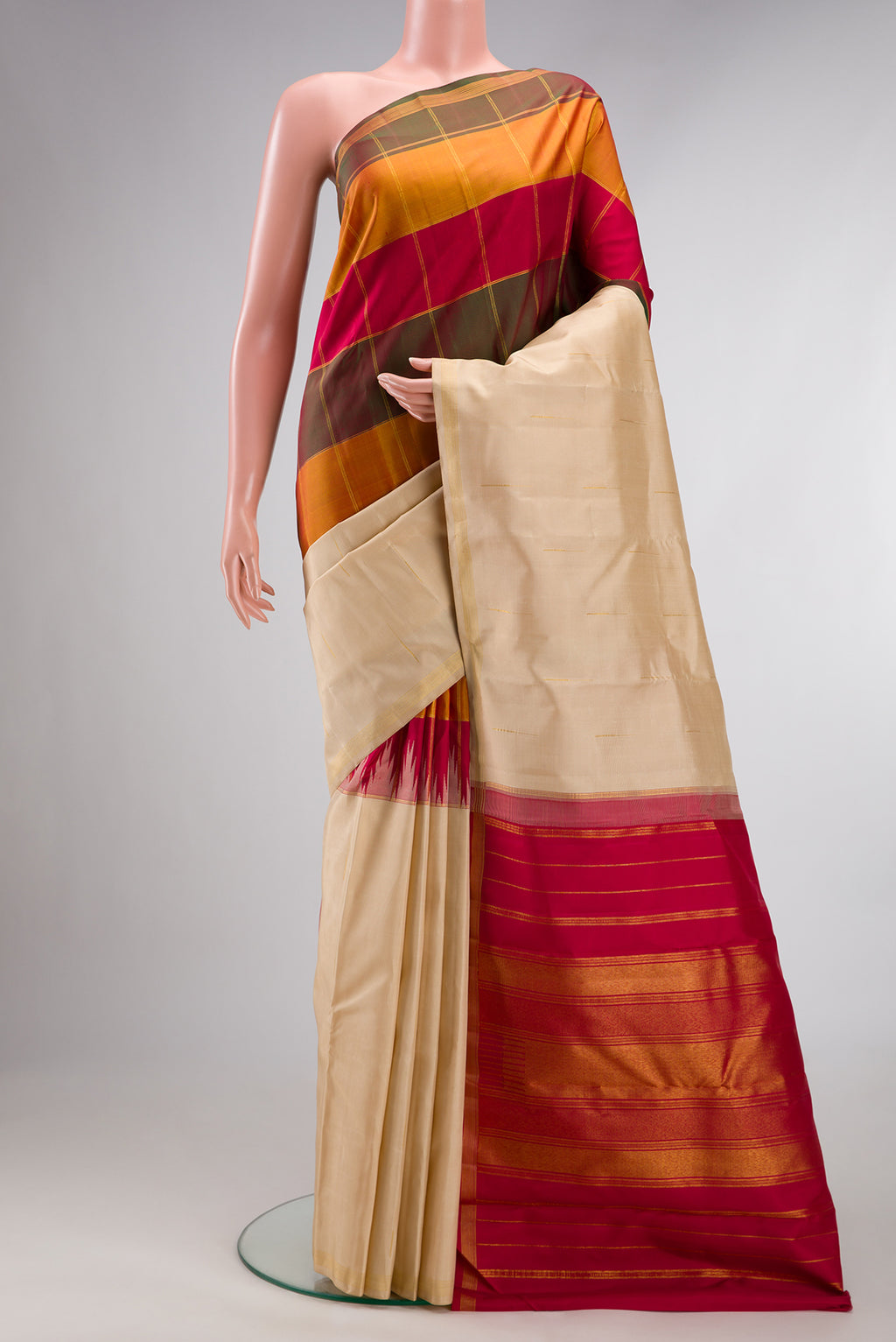 Pure Silk Multi Color Kanjivaram Saree with Half And Half on the body and Zari Border.  displayed on a mannequin