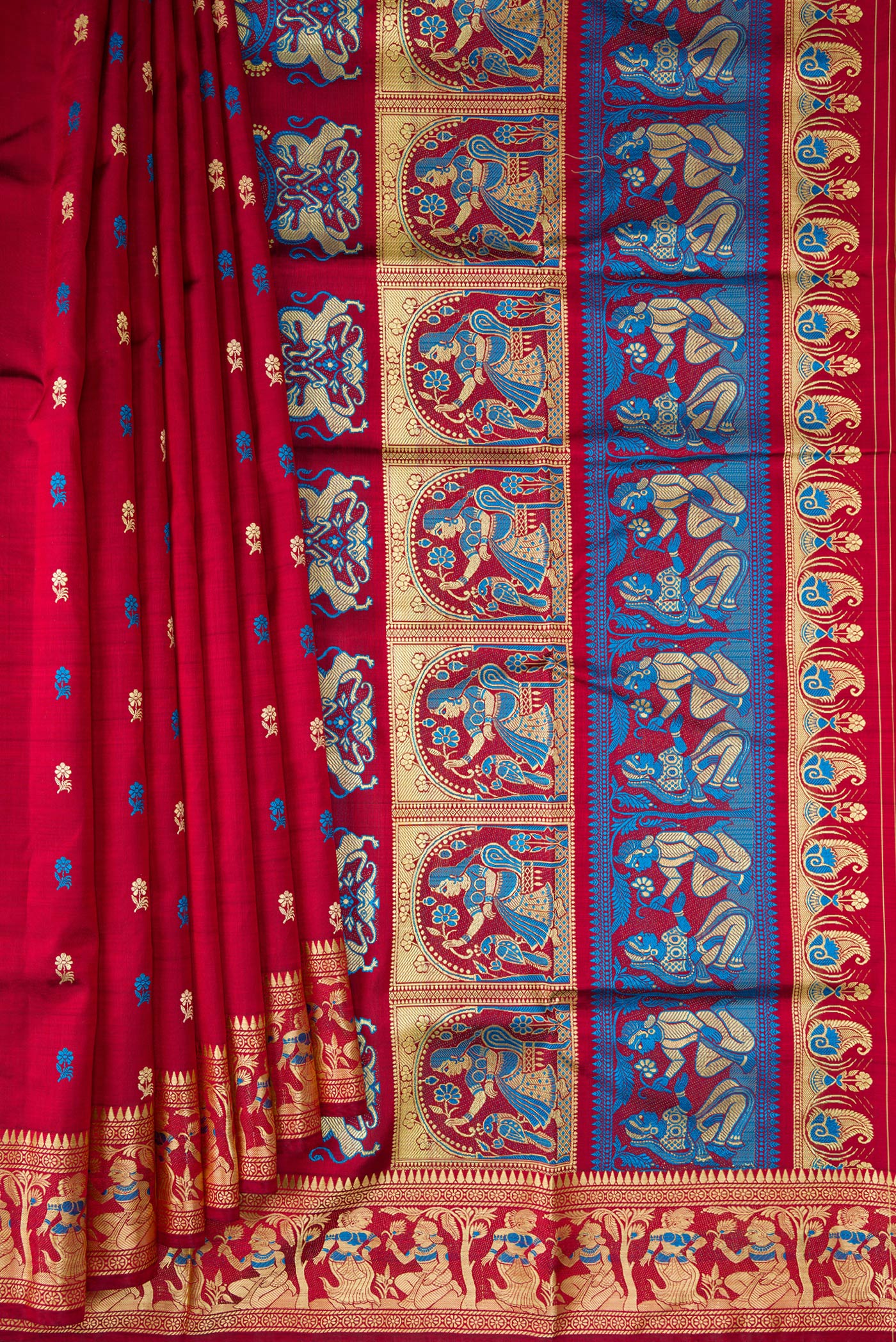 Pleats and pallu of Maroon Baluchari Silk Saree with Thread Butta on the body and Thread Border. 