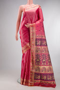 Coral Baluchari Silk Saree with Thread Butta on the body and Thread Border.  displayed on a mannequin