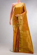 Mustard Dual Tone Kanjivaram Silk Saree with Zari Butta on the body and Zari Border.  displayed on a mannequin