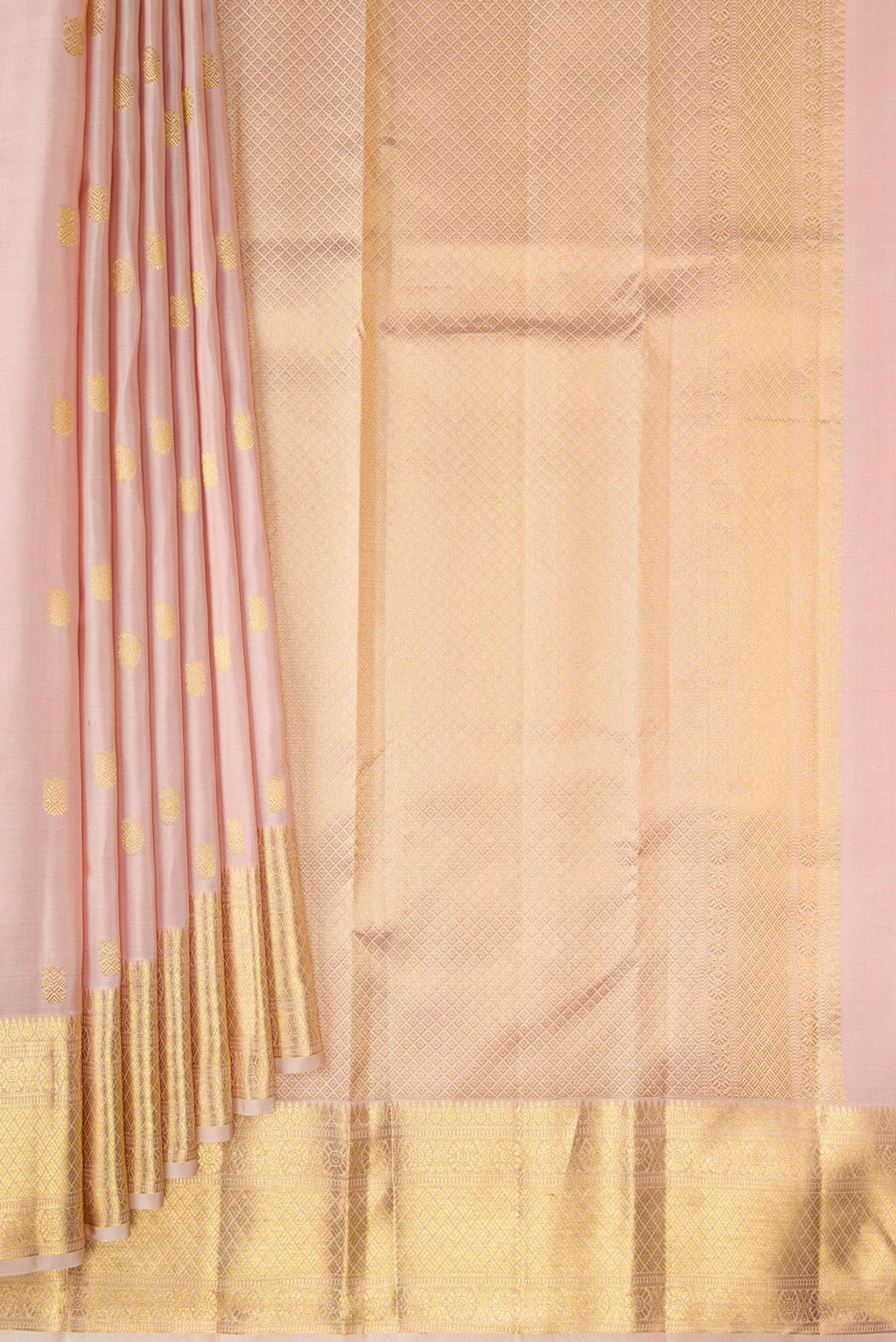 Pleats and pallu of Pure Silk Rose pink Kanjivaram Saree with Zari Butta on the body and Zari Border. 