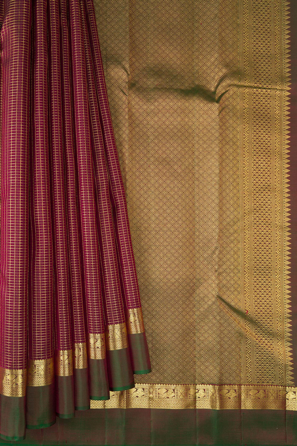 Pleats and pallu of Pure Silk Maroon Kanchipuram Saree with Checked design on the body and Zari Border. 