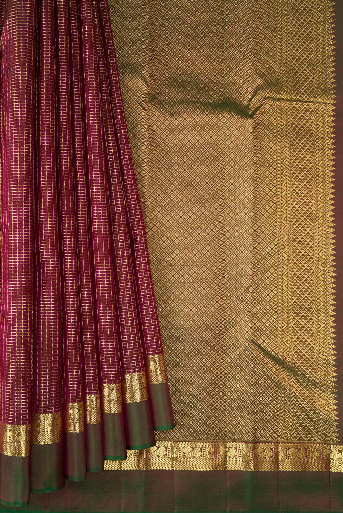 Pleats and pallu of Pure Silk Maroon Kanchipuram Saree with Checked design on the body and Zari Border. 