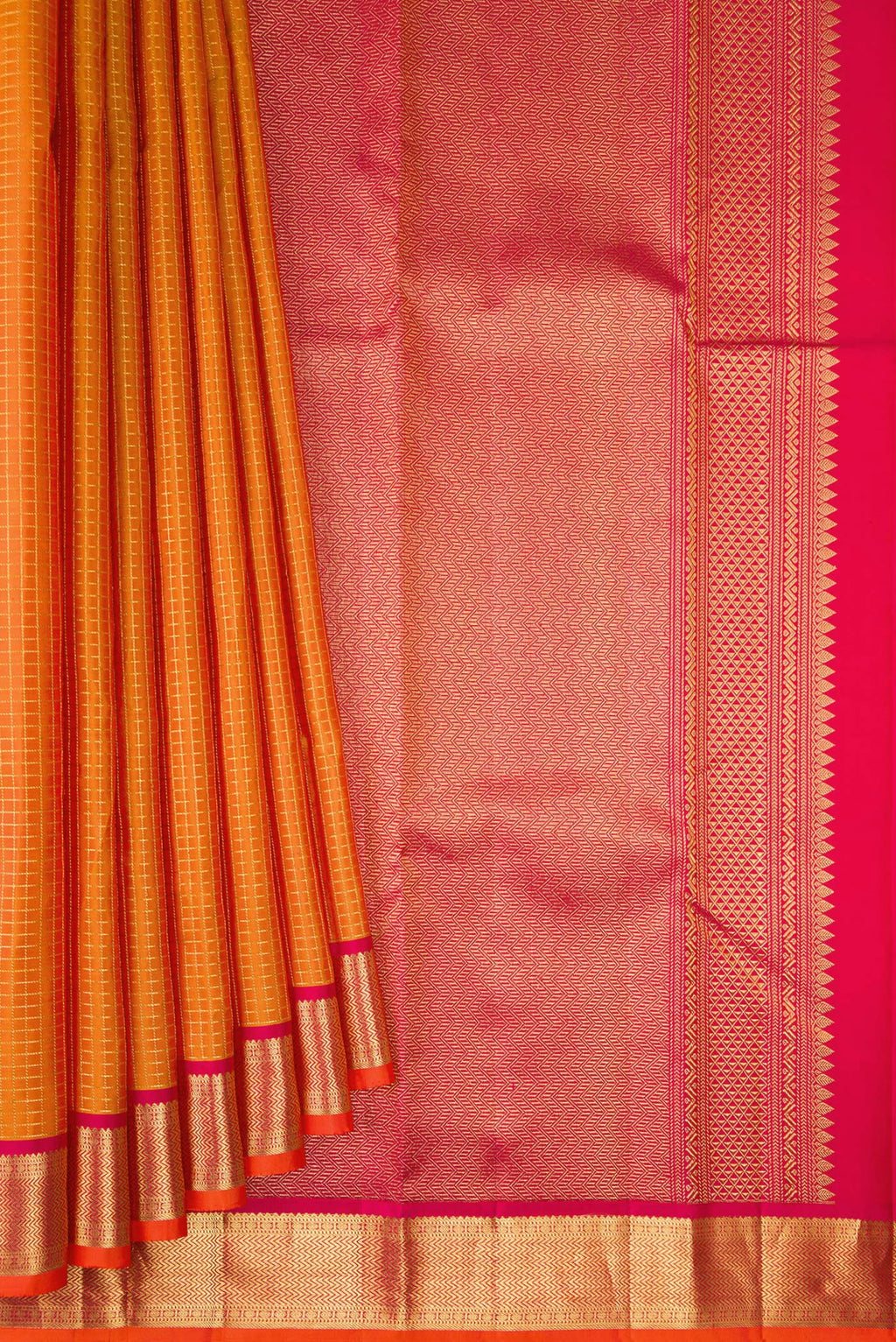 Pleats and pallu of Pure Silk Mustard Dual Tone Kanchipuram Saree with Checked design on the body and Zari Border. 