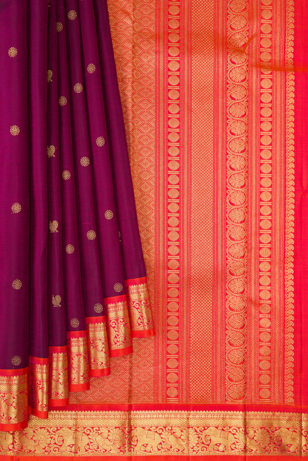 Pleats and pallu of Pure Silk Maroon Kanchipuram Saree with Zari Butta on the body and Zari Border. 