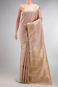 Pure Silk Sandal Kanchipuram Saree with Zari Butta on the body and Zari Border.  displayed on a mannequin