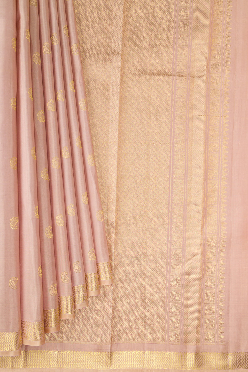 Pleats and pallu of Pure Silk Sandal Kanchipuram Saree with Zari Butta on the body and Zari Border. 