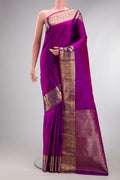 Pure Silk Purple Kanchipuram Saree with Checked design on the body and Zari Border.  displayed on a mannequin