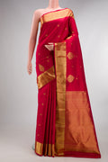 Pure Silk Red Kanchipuram Saree with Zari Butta on the body and Fancy Border.  displayed on a mannequin