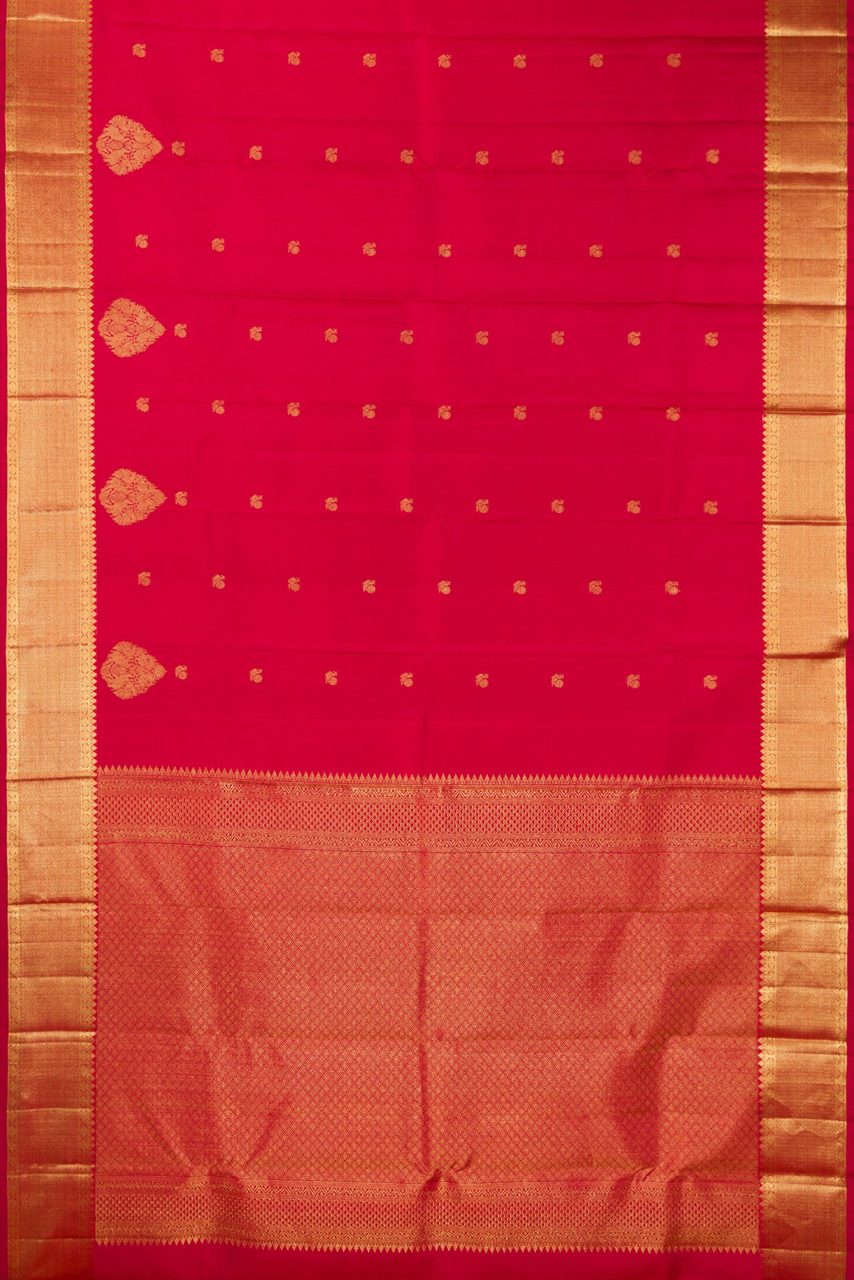 Flat view of Pure Silk Red Kanchipuram Saree with Zari Butta on the body and Fancy Border. 