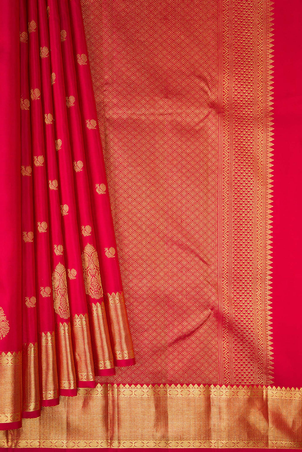 Pleats and pallu of Pure Silk Red Kanchipuram Saree with Zari Butta on the body and Fancy Border. 