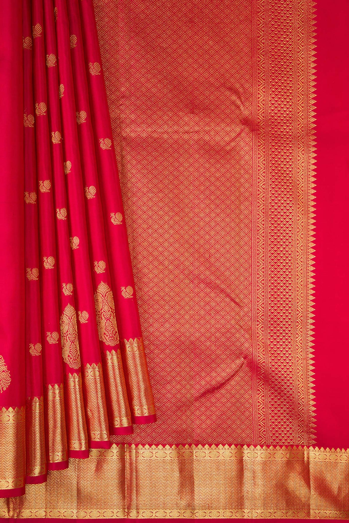 Pleats and pallu of Pure Silk Red Kanchipuram Saree with Zari Butta on the body and Fancy Border. 