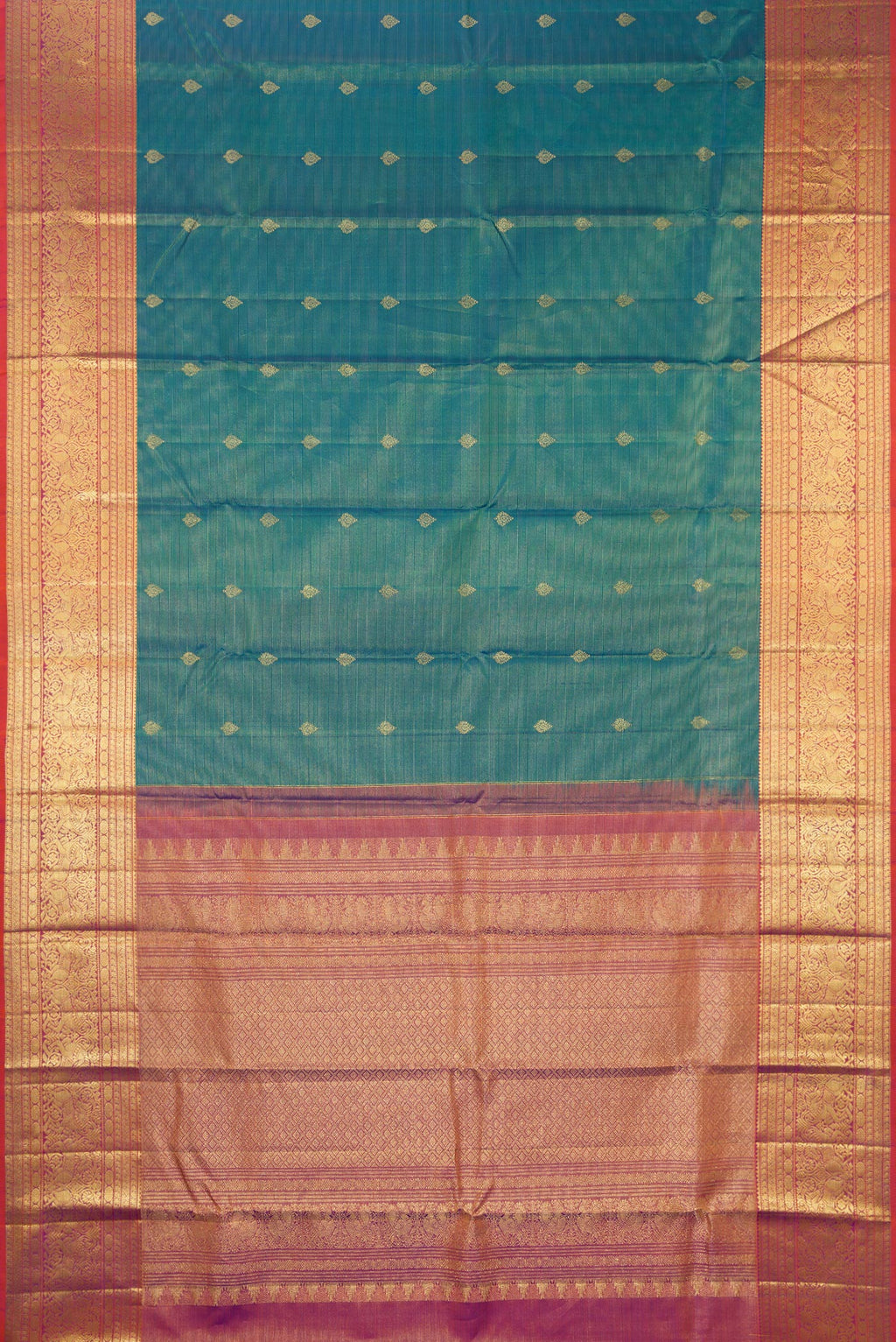 Flat view of Pure Silk Peacock Blue Dual Tone Kanchipuram Saree with Stripes on the body and Zari Border. 
