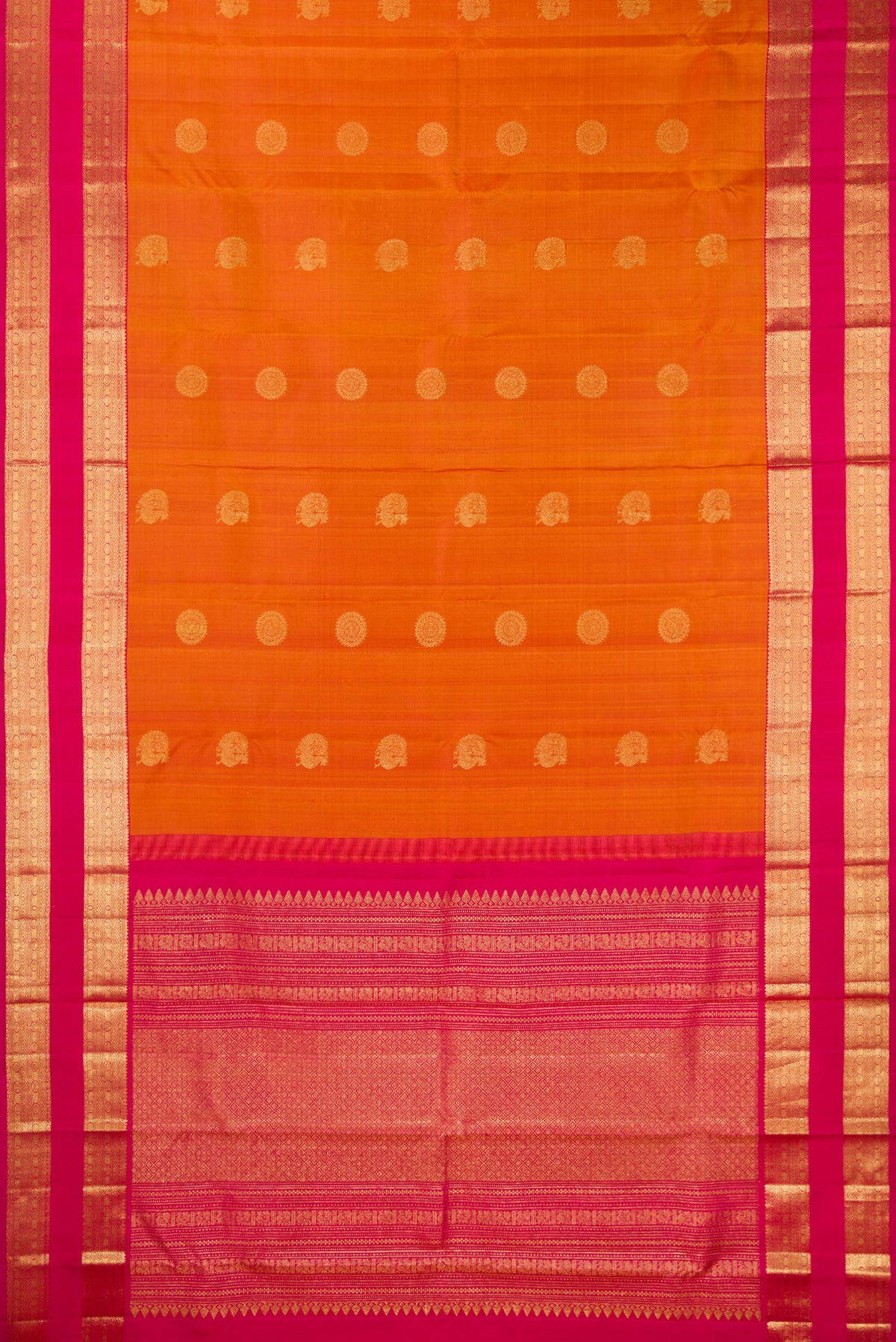Flat view of Pure Silk Mustard Kanchipuram Saree with Zari Butta on the body and Zari Border. 