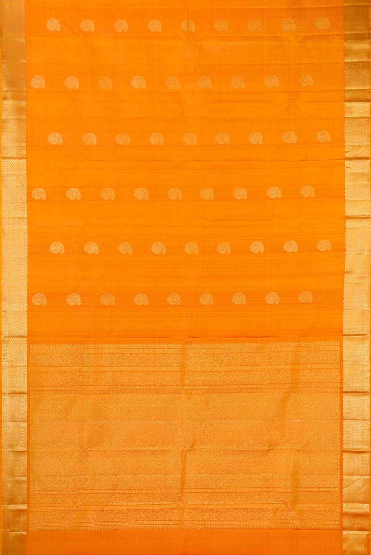 Flat view of Pure Silk Mustard Kanchipuram Saree with Zari Butta on the body and Zari Border. 