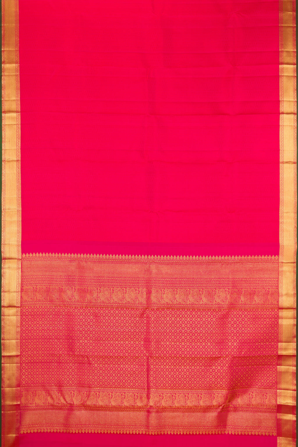 Flat view of Pure Silk Dark Pink Kanjivaram Saree with Jacquard design on the body and Zari Border. 