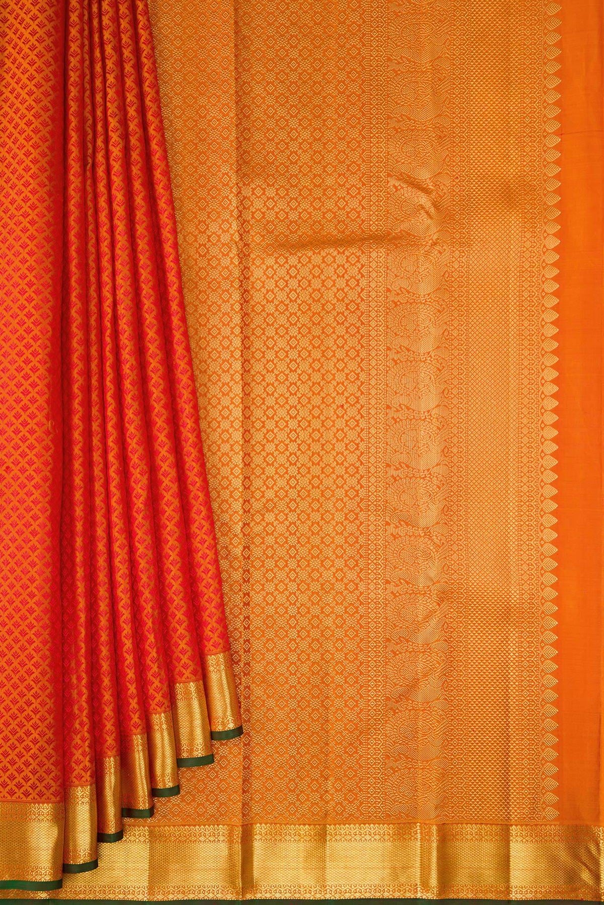 Pleats and pallu of Pure Silk Orange Kanjivaram Saree with Jacquard design on the body and Zari Border. 