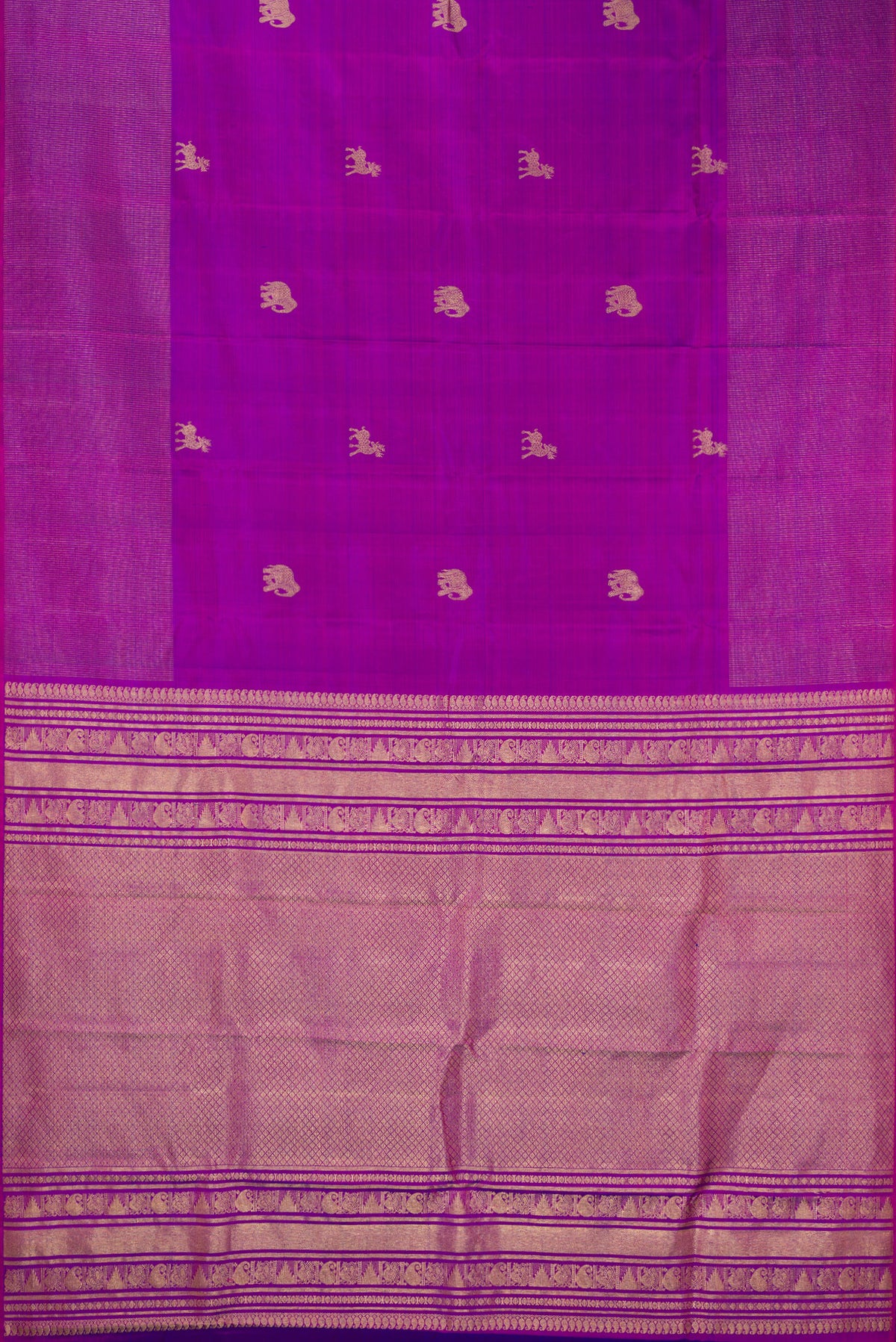 Flat view of Pure Silk Purple Kanchipuram Saree with Zari Butta on the body and Zari Border. 