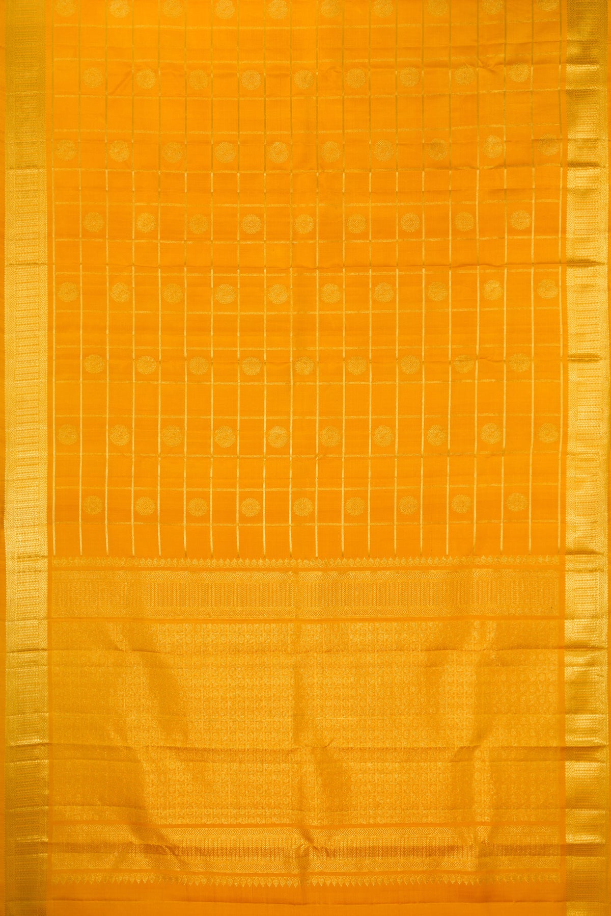 Flat view of Pure Silk Mustard Kanchipuram Saree with Checked design on the body and Zari Border. 
