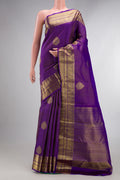 Pure Silk Purple Kanchipuram Saree with Zari Butta on the body and Zari Border.  displayed on a mannequin