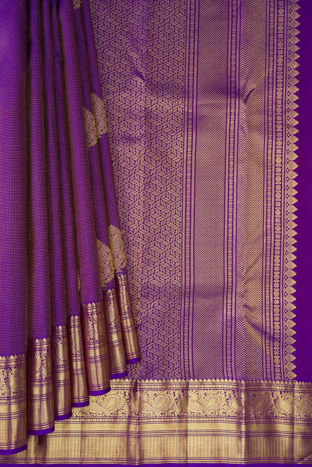 Pleats and pallu of Pure Silk Purple Kanchipuram Saree with Zari Butta on the body and Zari Border. 