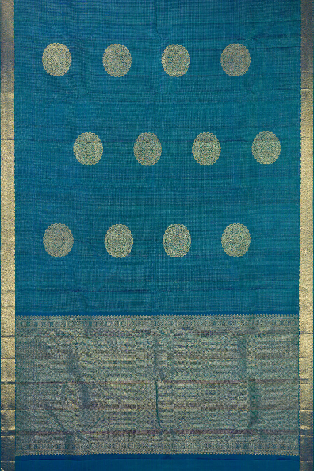 Flat view of Pure Silk Peacock Blue Dual Tone Kanchipuram Saree with Zari Butta on the body and Zari Border. 